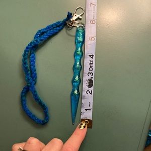 Blue/purple resin self defense keychain with stones